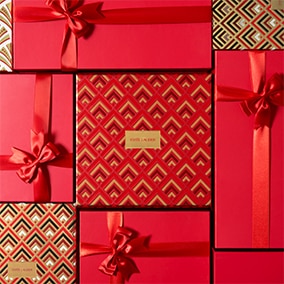 Christmas gift wrapped boxes in red