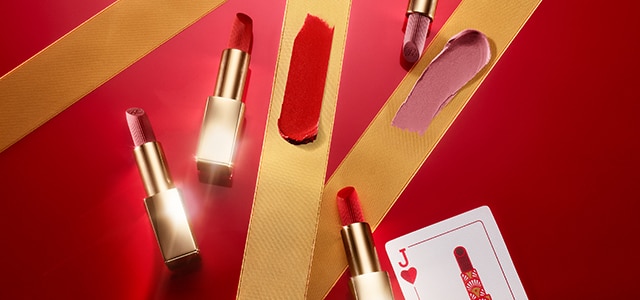 Pure Color Lipsticks on red holiday background