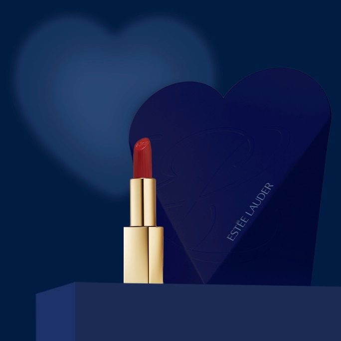 Lipstick placed in front of a heart shaped shadow