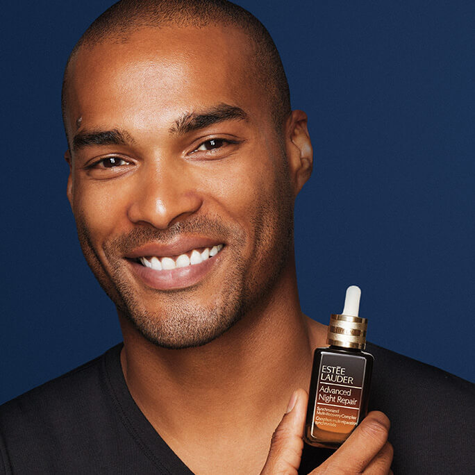 An Advanced Night Repair Serum on a red background